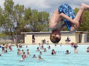 Aiden Dolph cools off in Regent Park Pool in Regina on June 26, 2015. Temperatures are expected to hover around the 30-degree mark until Tuesday.