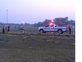 Regina Police Services reconstruct the scene of a single-vehicle accident involving a motorcyclist in the northbound lanes of the Ring Road, north of Arcola Avenue, on Friday evening.