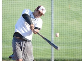 Regina Reds outfielder Brandon Beaudin-Herney spends some time in the batting cage at Optimist Baseball Park in Regina on Sunday August 9, 2015.