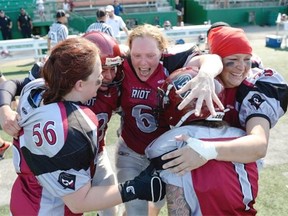 Regina Riot receiver Claire Dore (#6) celebrates a victory over the Saskatoon Valkyries during a playoff game held at Mosaic Stadium in Regina on Sunday June 28, 2015. (Michael Bell/Regina Leader-Post)