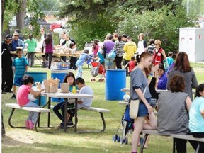 SaskEnergy planed to feed up to 800 people with their SaskEnergy BBQs set up in the green space at Evraz Place in Regina July 14, 2015.