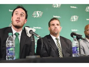 (L-R) Saskatchewan Roughriders president and CEO Craig Reynolds, interim GM Jeremy O'Day and interim head coach Bob Dyce during a news conference regarding the firings of Roughriders head coach Corey Chamblin and general manager Brendan Taman in Regina on September 01, 2015.