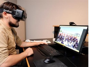 Rene Dufour-Contreras, VR developer for Talking Dog Studios, demonstrates a virtual reality experience of the RCMP musical ride.