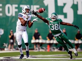 The Riders’ defensive collapse on Sunday included this touchdown catch in overtime by the Toronto Argonauts’ Tori Gurley, who scored the game’s final touchdown despite the efforts of a lunging Tristan Jackson. (Michael Bell/Leader-Post files