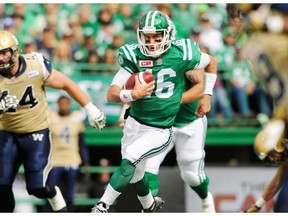 Riders quarterback Brett Smith takes off on another run against the Blue Bombers in Sunday’s Labour Day Classic (THE CANADIAN PRESS/Mark Taylor)