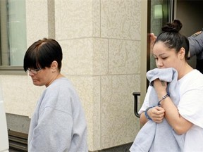 Rosalyn (left) and Sarah Wilm, who pleaded guilty to manslaughter and were sentenced in relation to the death of Ray Yacevich in March 2014, leaving Court of Queen’s Bench Friday.