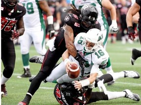 Roughriders’ Brett Smith (centre) went all out for a two-point convert in Sunday’s 35-13 loss to the Ottawa Redblacks THE CANADIAN PRESS/Justin Tang