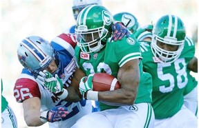 The Roughriders’ Jerome Messam, with the football, rushed for some of the season-high 111 yards in Sunday’s 33-21 victory over the Montreal Alouettes (Michael Bell/Leader-Post)The Roughriders' Jerome Messam, with the football, rushes for some of the season-high 111 yards he gained in Sunday's 33-21 victory over the Montreal Alouettes. 
  
 Michael Bell/Leader-Post