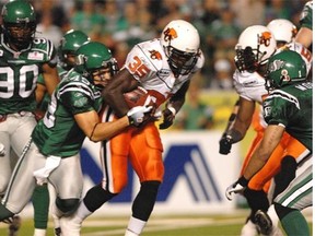 The Roughriders’ Joel Lipinski tackles Martell Mallett of the B.C. Lions during a July 3, 2009 game at Mosaic Stadium.