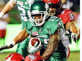 Roughriders running back Steven Miller, 10, shown last season against Calgary, could make his 2015 debut Saturday when Saskatchewan plays the host Toronto Argonauts.