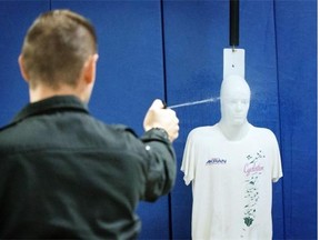 The Saskatchewan Police College says defensive tactics training, including exposure to pepper spray, is mandatory for recruits. However, the college doesn’t involve recruits in research studies. (Pat McGrath/The Ottawa Citizen)