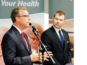 Saskatchewan Premier Brad Wall (L) and Health Minister Dustin Duncan during a news conference on June 4, 2012. (Don Healy / Leader-Post files)