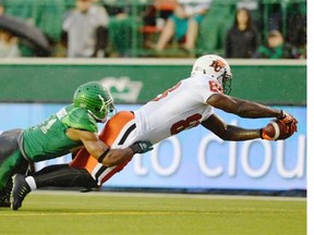 Saskatchewan Roughriders defensive back Macho Harris (#3) can’t stop BC Lions receiver A.C. Leonard (#88) from scoring a touchdown during first half CFL action at Mosaic Stadium in Regina on Friday.