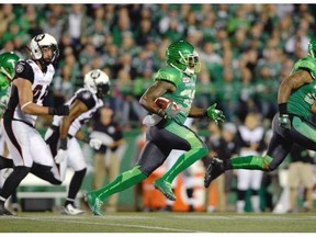 Saskatchewan Roughriders defensive back Tristan Jackson (#38) makes yards during a game held at Mosaic Stadium in Regina, Sask. on Saturday Sep. 19, 2015.