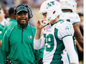 Saskatchewan Roughriders head coach Bob Dyce calls out to Ray Early (39) during second half CFL action against the Winnipeg Blue Bombers in Winnipeg Saturday, September 12, 2015. THE CANADIAN PRESS/John Woods