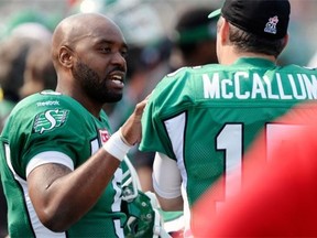 Saskatchewan Roughriders quarterback Kevin Glenn (#5) speaks to Saskatchewan Roughriders kicker Paul McCallum (#15) during a game held at Mosaic Stadium in Regina on Sunday July 5, 2015. (Michael Bell/Regina Leader-Post)