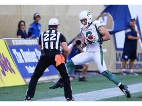 Saskatchewan Roughriders receiver Rob Bagg executes a toe-drag in order to score a touchdown Saturday against the Winnipeg Blue Bombers. 
  
  
 Kevin King/Winnipeg Sun/Postmedia Network