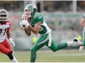 Saskatchewan Roughriders receiver Devin Wilson, shown scoring his first CFL touchdown Saturday against the visiting Calgary Stampeders, was a bright spot for the Green and White as its record dropped to 0-8. 
  
 Michael Bell/Leader-Post