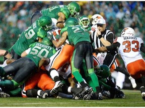 Saskatchewan Roughriders stop a third down attempt by the B.C. Lions during first half CFL action at Mosaic Stadium in Regina on Friday. TROY FLEECE / Regina Leader-Post