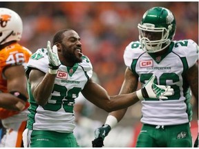 Saskatchewan Roughriders’ Tristan Jackson, 38, shown celebrating a kickoff return on Saturday in Vancouver, had an up-and-down game against the host B.C. Lions (Darryl Dyck/The Canadian Press)
