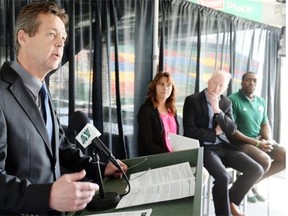 Saskatchewan Roughriders vice-president of business development and marketing, Gregg Sauter, (L) praised the CFL’s new violence against women policy. (DON HEALY/Regina, Leader-Post)