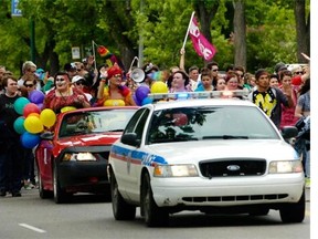 A scene from a Regina Pride Parade from 2011, featuring a Regina Police Service vehicle. In later years, police marched in uniform to show their support for the city's LGBTQ community.