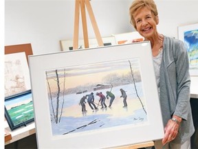 Sheila McKague with an Allen Sapp printers proof titled, Practising for the Game which is a piece of donated art that will be sold at Art from the Attic on Sept. 26th at the Cathedral Neighbourhood Centre.  Its in support of Grandmothers 4 Grandmothers a Regina fundraiser to support the work of the Stephen Lewis Foundation’s Grandmothers Campaign in partnership with projects in sub-Saharan Africa, where grandmothers are raising the children orphaned by AIDS.