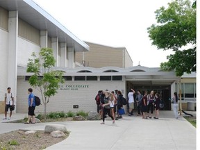 Students leave Campbell Colligate after a brief afternoon lockdown in Regina on Wednesday.