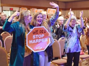 NDP supporters cheer as NDP candidate Erin Weir speaks after his election win in the Regina-Lewvan riding in Regina on October 19, 2015.