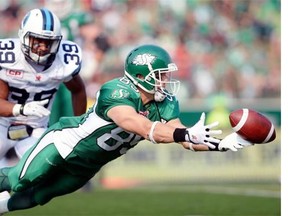 Toronto Argonauts defensive back Matt Black (#39) looks on while Saskatchewan Roughriders slotback Chris Getzlaf (#89) just misses a pass that would have tied the game during a game held at Mosaic Stadium in Regina on Sunday July 5, 2015.