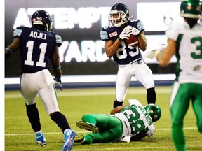 The Toronto Argonauts’ Diontae Spencer, 85, scores a 52-yard touchdown that proved to be the game-winner Saturday as the Double Blue handed the Saskatchewan Roughriders a 30-26 loss at Rogers Centre. Spencer’s TD snapped a 23-23 tie at 4:41 of the fourth quarter.