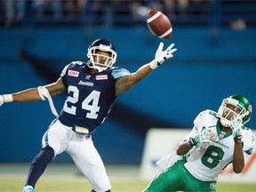 The Toronto Argonauts’ A.J. Jefferson 24, breaks up a pass in front of the Saskatchewan Roughriders’ Korey Williams in the final seconds of Saturday’s CFL game in Toronto. The Argonauts held on for a 30-26 victory, leaving Saskatchewan with an 0-7 record for the first time since 1979. 
 Frank Gunn/The Canadian Press 
  
 Frank Gunn/The Canadian Press