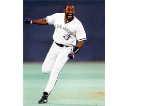 Toronto Blue Jays' Joe Carter celebrates as he runs the bases after his game-winning three-run home run to win the World Series Saturday, Oct. 23, 1993 at Skydome in Toronto. The Jays defeated the Phillies 8-6 to win the Series 4-2. THE CANADIAN PRESS/Hans Deryk