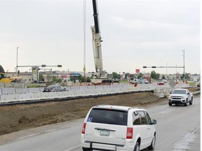 Traffic moves on the Victoria Ave. North Service road through the Coleman Cres. intersection as construction on Victoria Ave. continues August 20, 2015. 
 BRYAN SCHLOSSER/Regina Leader-Post