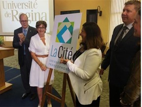 The University of Regina launches La Cite universitairie francophone on Tuesday. Graham Fraser, commisioner of official languages, Francoise Sigur-Cloutier, president of the Assemblee communautaire fransaskoise, Vianne Timmons, U of R president and Scott Moe, minister of advanced education, unveil the new logo to accompany the new francophone entity on campus. Austin M. Davis/Leader-Post