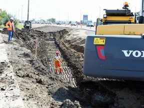 Work crews work on the widening of Victoria Avenue between Coleman Crescent and Prince of Wales Drive in Regina on August 11, 2015. (DON HEALY/Leader-Post)