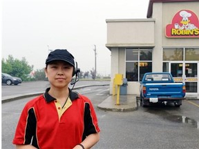 Yinghua Liu, owner of the east Robin’s Donuts, says she will have to close the business if the city goes ahead wit its plan to remove the bridge on Eastgate Drive.