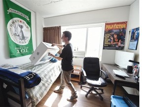 Zach Almond from Lloydminster settles in on the 14th floor of the new residence towers at the University of Regina, called Kisik Towers, on Wednesday, Sept. 2, 2015. (DON HEALY/Regina Leader-Post)