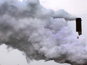 WINDSOR, ON. Feb. 26, 2015.   A smoke stack on Zug Island is shown on Thursday, Feb. 26, 2015, from the Detroit River. (DAN JANISSE/ The Windsor Star) pollution, hum, Detroit, steel plant