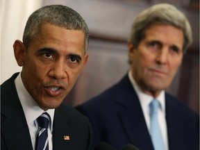 U.S. President Barack Obama, flanked by U.S. Secretary of State John Kerry (R), announces his decision to reject the Keystone XL pipeline proposal, at the White House November 6, 2015 in Washington, DC. President Obama cited concerns about the impact on the environment, saying it would not serve the interests of the United States.