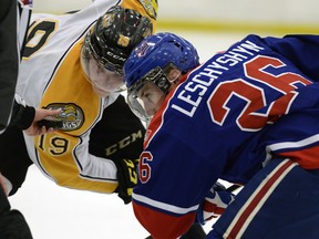 The Regina Pats' Jake Leschyshyn, right, shown facing off with Nolan Patrick of the Brandon Wheat Kings, has just returned from the World Under-17 Hockey Challenge.