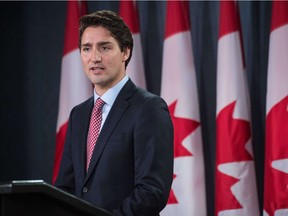 Canadian Liberal Party leader Justin Trudeau speaks at a press conference in Ottawa on October 20, 2015 .