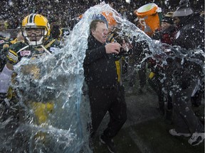 Edmonton Eskimos head coach Chris Jones, shown being doused with Gatorade after Sunday's Grey Cup victory, stands to be showered with cash during the off-season.