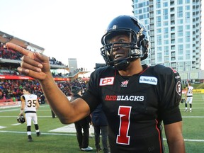 Henry Burris of the Ottawa Redblacks celebrates his team's victory over the Hamilton Tiger-Cats in Sunday's CFL East Division final.