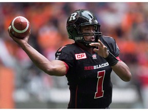 Ottawa Redblacks' quarterback Henry Burris passes against the B.C. Lions during the first half of a CFL football game in Vancouver, B.C., on Sunday September 13, 2015.