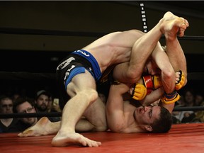 Regina's Matt Fedler (bottom) come out on top in this match with Saskatoon's Jesse Boldt at the Saturday Night Fights 10