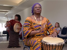 Muna De Ciman, right, and Carol Daniels, left, drum at the MacKenzie Art Gallery in Regina on Nov. 15, 2015. The multicultural drum circle was in celebration of Saskatchewan Multicultural Week.