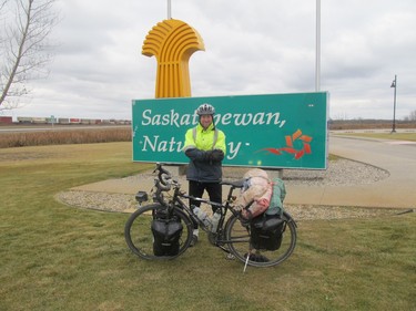 Mike Boles returns to Saskatchewan at the end of his bike journey around the world.