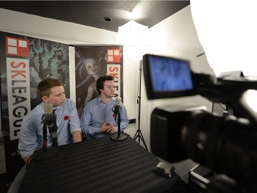 Peter Mckay, left, and Carter Astleford, center, provide live commentary during a match at SKLeague eSports tournament held at Matrix Gaming Centre in Regina, Sask. on Saturday Nov. 7, 2015. (Michael Bell/Regina Leader-Post)