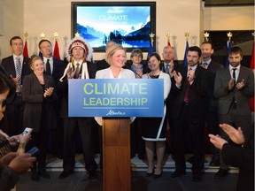 Premier Rachel Notley unveils Alberta's climate strategy in Edmonton, Alberta, on Sunday. The new plan will include carbon tax and a cap on oilseeds emissions among other strategies.